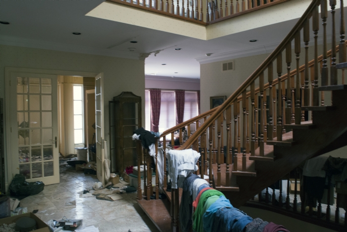 There are clothes scattered throughout the house.